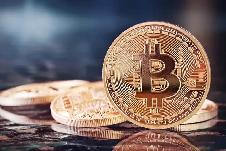 Bitcoin frôle la rupture du seuil des 70 000 dollars